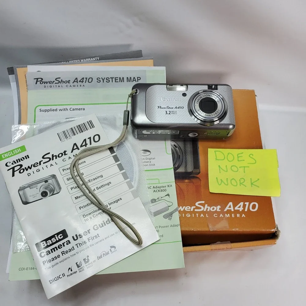 Canon PowerShot A410 Digital Camera Silver 3.2MP Point & Shoot FOR PARTS REPAIR